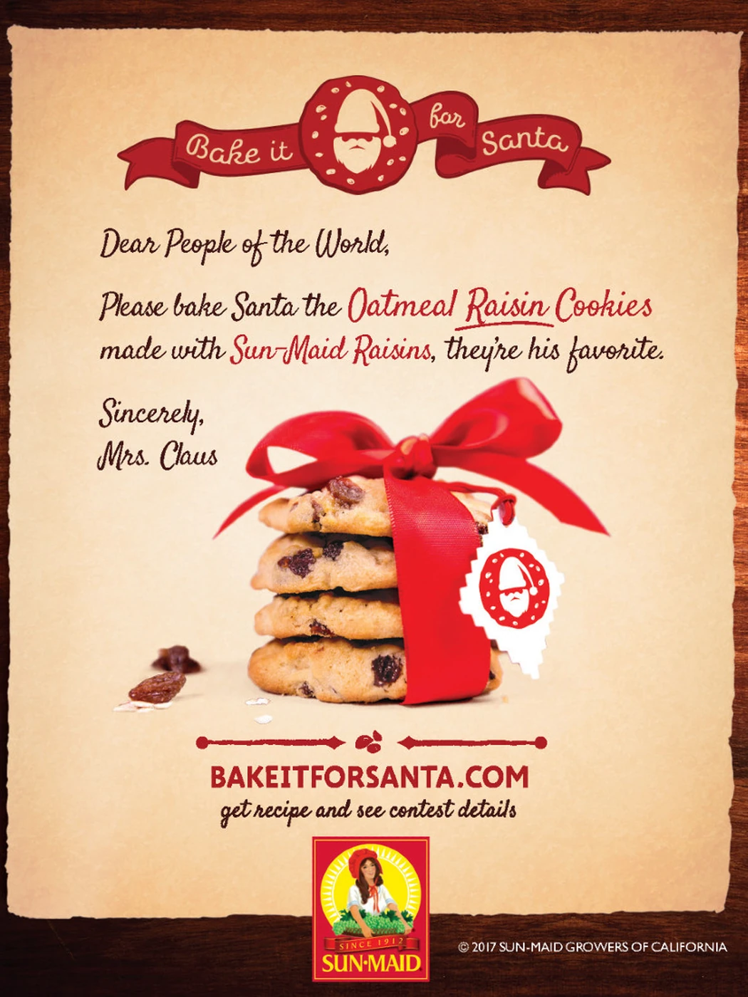 Print advertisement signed by Mrs. Claus, with cookies and a mailbox